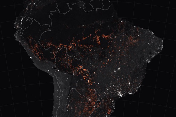 epa07789490 A handout photo made available by NASA Earth Observatory of a map showing active fire detections in Brazil as observed by Terra and Aqua MODIS satellites between 15 and 19 August 2019 (iss ...