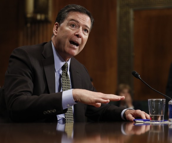 FILE - In this May 3, 2017 file photo, then-FBI Director James Comey testifies on Capitol Hill in Washington. Comey, ousted last month amid a federal investigation into connections between Russia and  ...