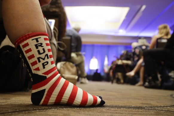 A Trump supporter listens as Brad Parscale, campaign manager for Trump&#039;s 2020 reelection campaign, speaks during the California GOP fall convention on Saturday, Sept. 7, 2019, in Indian Wells, Ca ...