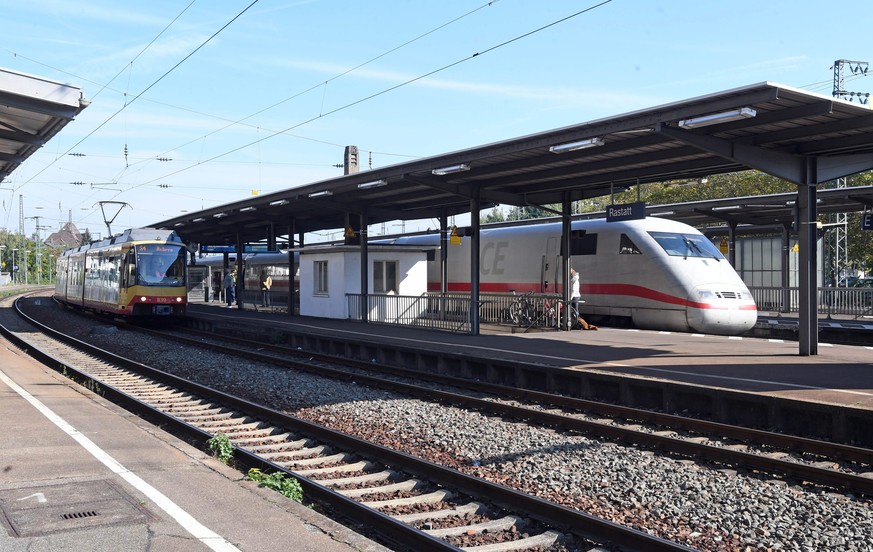 epa05580828 A train arrives at the rail station in Rastatt, Germany, 11 October 2016. The station was closed during the morning hours due to a bomb scare. Police informed that the threat was received  ...