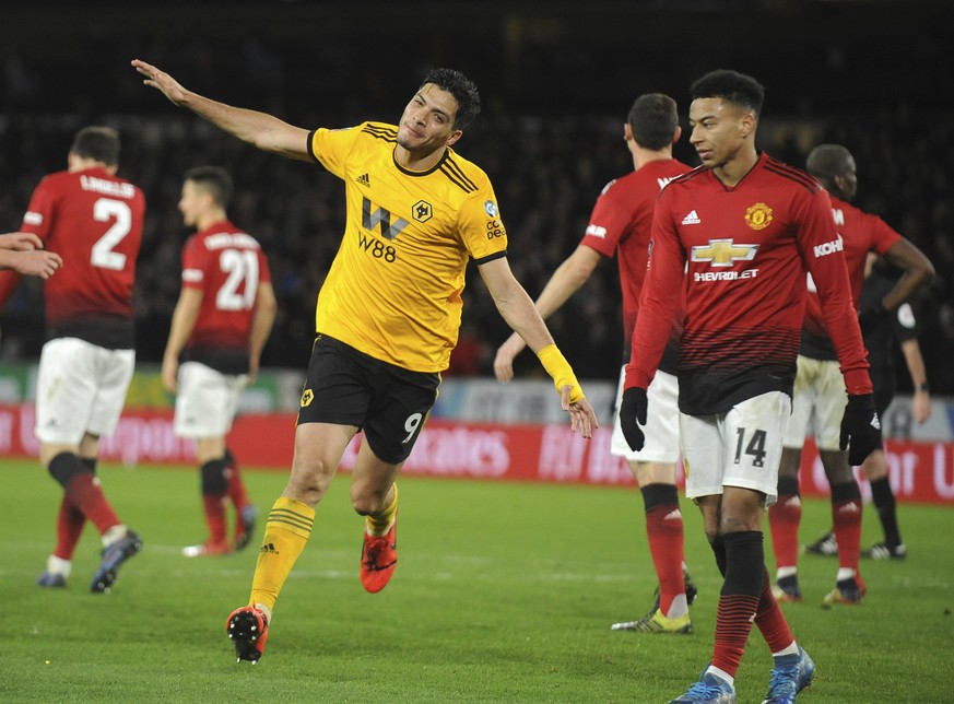 Wolverhampton&#039;s Raul Jimenez celebrates after scoring his side&#039;s opening goal during the English FA Cup Quarter Final soccer match between Wolverhampton Wanderers and Manchester United at th ...