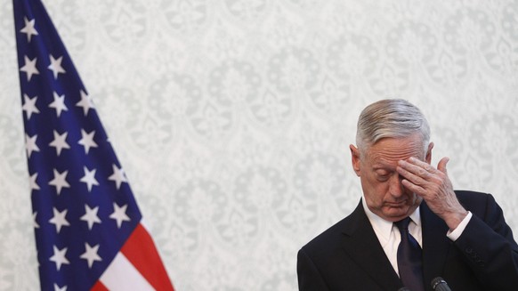 epa07242843 (FILE) - US Defense Secretary James Mattis gestures during a joint press conference with Afghan President Ashraf Ghani, and NATO Secretary General Jens Stoltenberg (both not pictured), in  ...