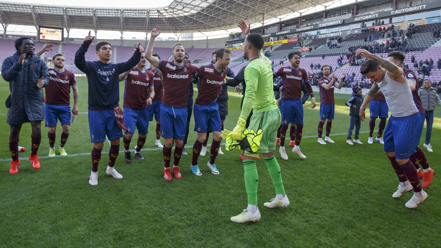 Servette&#039;s players celebrate their victory after beating Chiasso, during the Challenge League soccer match of Swiss Championship between Servette FC and FC Chiasso, at the Stade de Geneve stadium ...