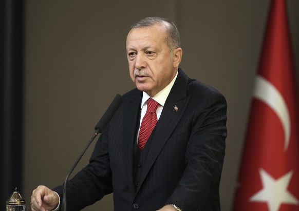 Turkish President Recep Tayyip Erdogan speaks to reporters, in Ankara, Turkey, Thursday, Nov. 7, 2019. Erdogan said Thursday members of slain Islamic State group leader Abu Bakr al-Baghdadi&#039;s &qu ...