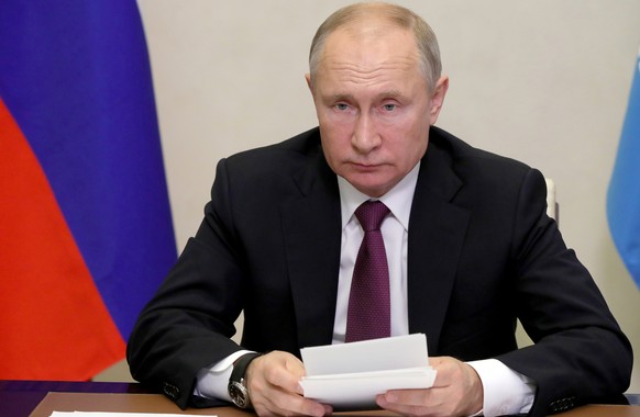 Russian President Vladimir Putin speaks via video call during at the Summit of leaders from the Commonwealth of Independent States (CIS) at the Novo-Ogaryovo residence outside Moscow, Russia, Friday,  ...