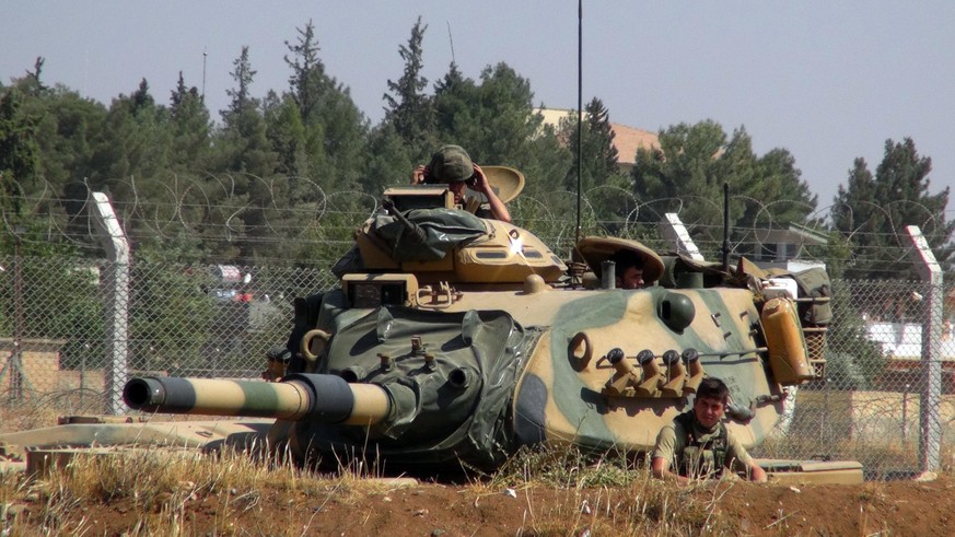 A Turkish army tank stationed near the Syrian border, in Suruc, Turkey, Saturday, Sept. 3, 2016. Turkey&#039;s state-run news agency says Turkish tanks have entered Syria&#039;s Cobanbey district nort ...