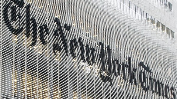FILE - This Wednesday, Oct. 10, 2012 file photo shows the New York Times logo on the company&#039;s building in New York. On Friday, July 3, 2020, The Associated Press reported on a manipulated video  ...