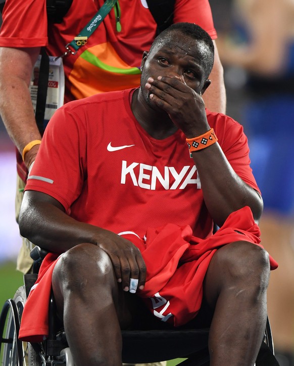 epa05504106 Julius Yego of Kenya is wheeled off after he sustained an injury in the men&#039;s Javelin Throw final of the Rio 2016 Olympic Games Athletics, Track and Field events at the Olympic Stadiu ...