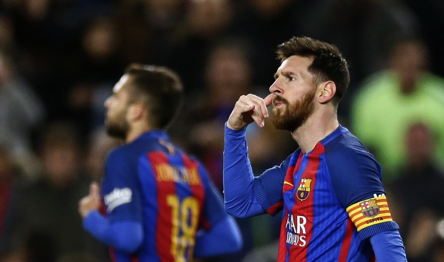 FC Barcelona&#039;s Lionel Messi gestures after scoring during the Spanish La Liga soccer match between FC Barcelona and Celta Vigo at the Camp Nou in Barcelona, Spain, Saturday, March 4, 2017. (AP Ph ...