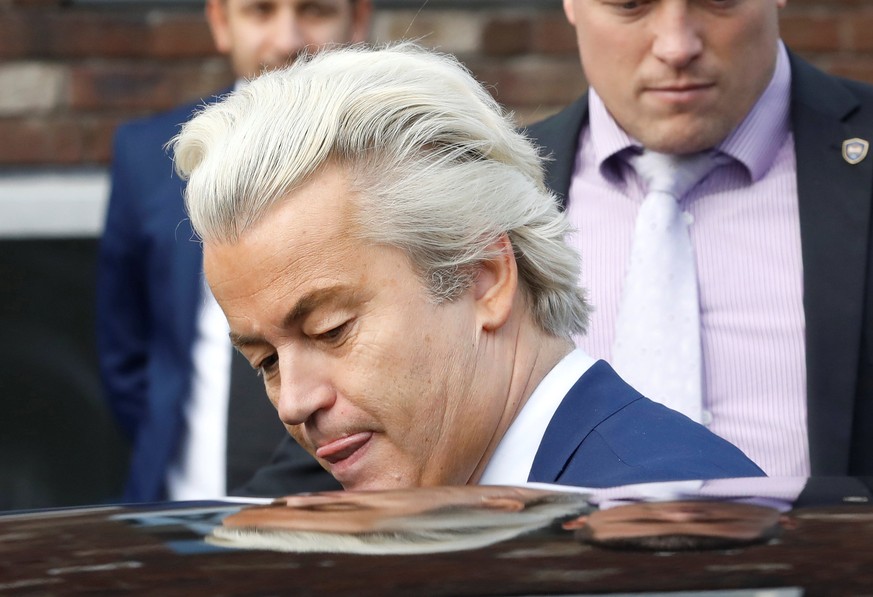 Dutch far-right politician Geert Wilders of the PVV party leaves a polling station after voting in the Dutch general election in The Hague, Netherlands, March 15, 2017. REUTERS/Yves Herman