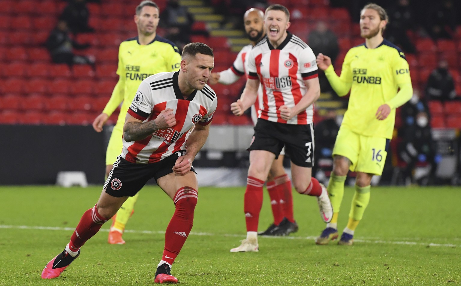 Sheffield United&#039;s Billy Sharp celebrates after scoring his side&#039;s first goal during the English Premier League soccer match between Sheffield United and Newcastle United at the Bramall Lane ...