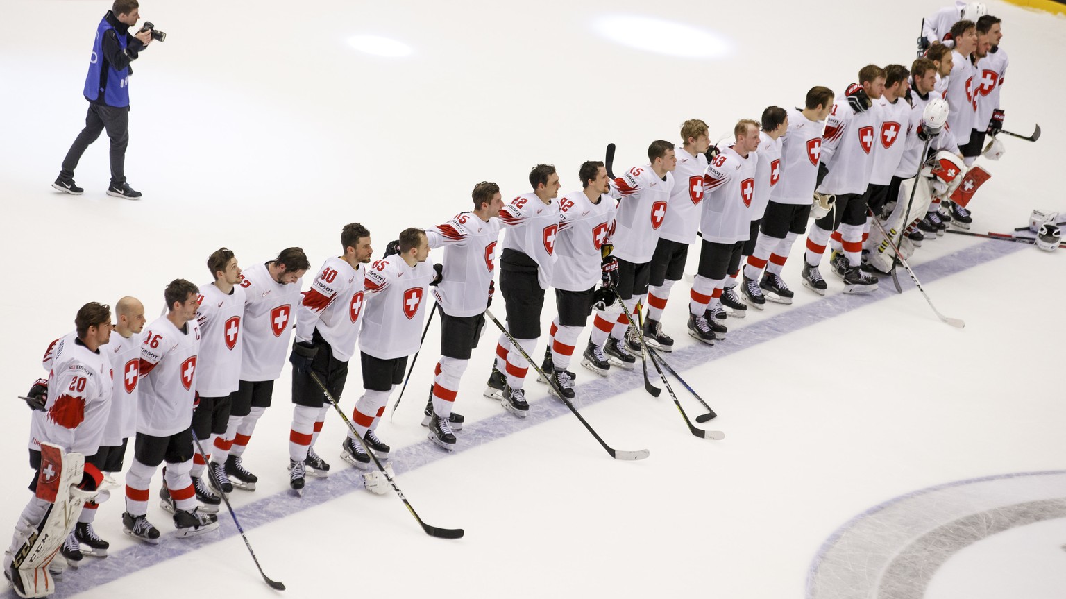 Switzerland&#039;s listen the Swiss anthem after beating Finland, during the IIHF 2018 World Championship quarter final game between Finland and Switzerland, at the Jyske Bank Boxen, in Herning, Denma ...