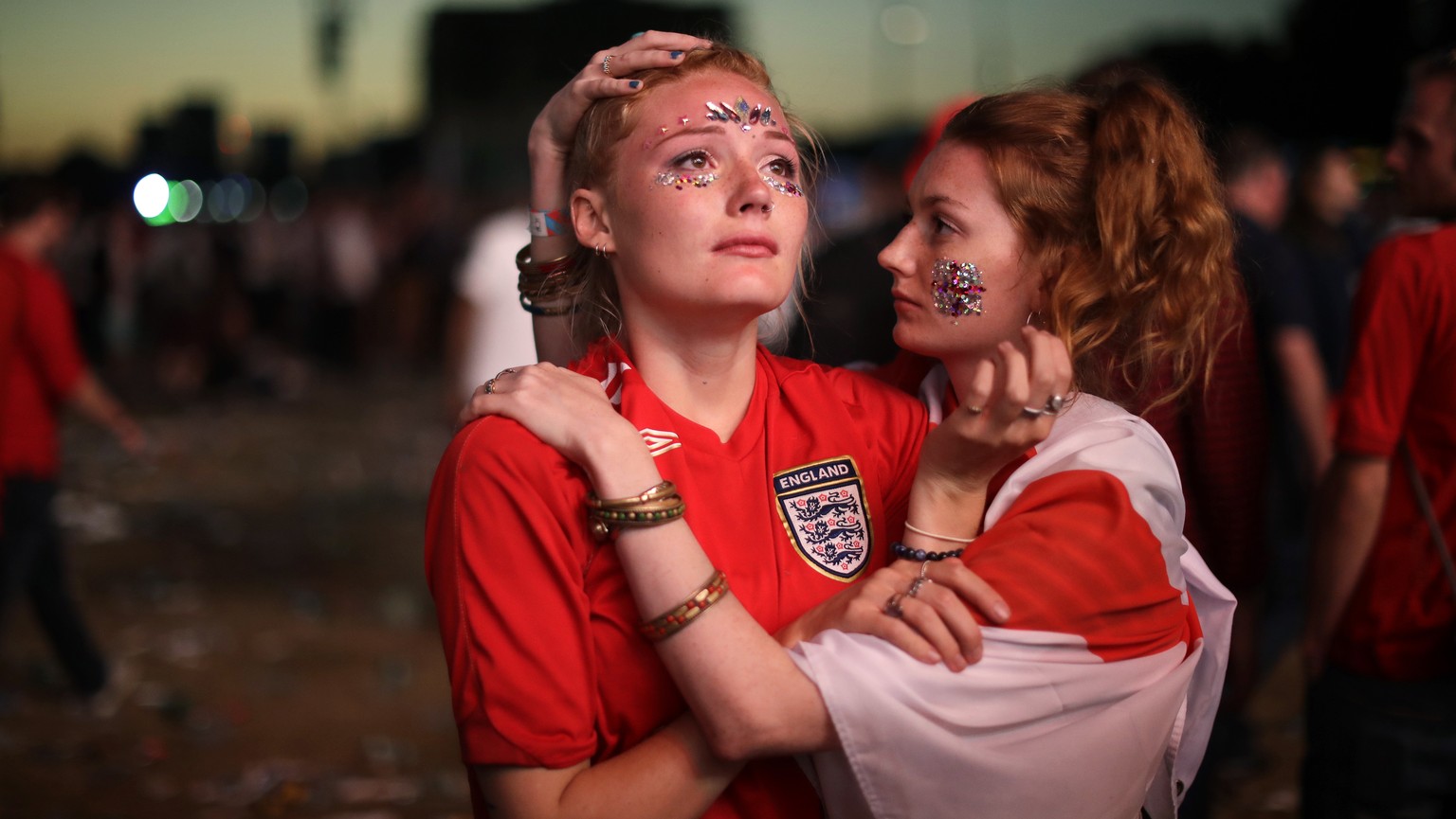 England soccer fans react after England national soccer team lost the semifinal match between Croatia and England at the 2018 soccer World Cup, in Hyde Park, London, Wednesday, July 11, 2018. (AP Phot ...