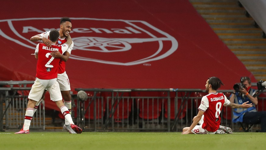 Arsenal&#039;s Pierre-Emerick Aubameyang, centre, celebrates with teammates after scoring his team&#039;s second goal during the FA Cup semifinal soccer match between Arsenal and Manchester City at We ...