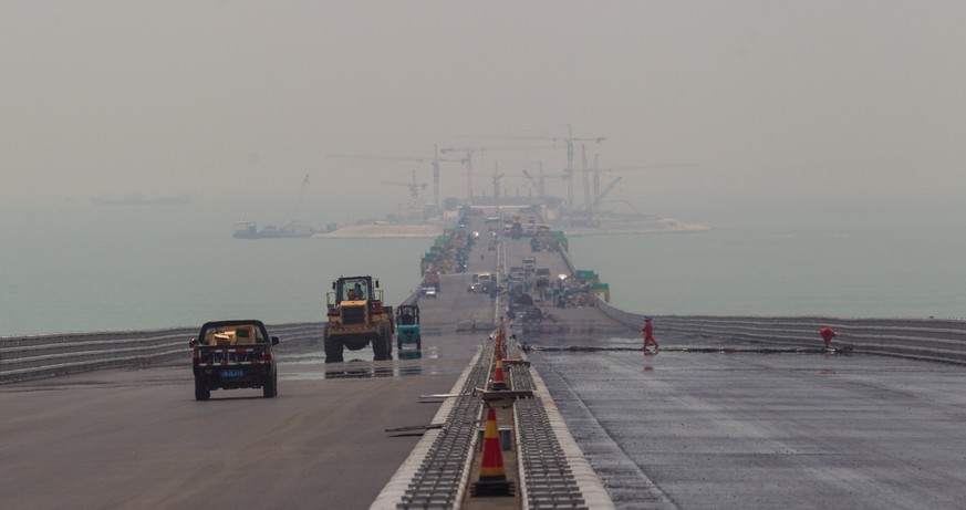 epa05969615 General view of the Hong Kong-Zhuhai-Macau Bridge construction site in Zhuhai, Guangdong province, China on 17 May 2017. The Hong KongZhuhaiMacau Bridge is an ongoing construction projec ...