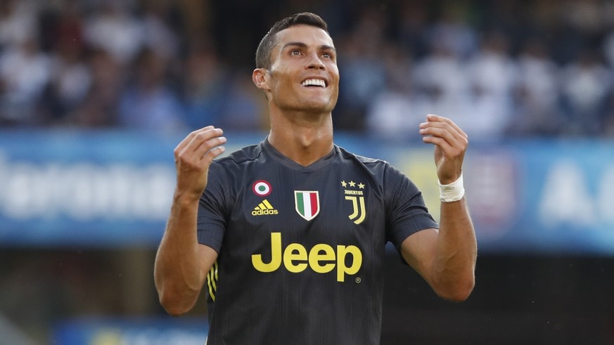 Juventus&#039; Cristiano Ronaldo runs with the ball during the Serie A soccer match between Chievo Verona and Juventus, at the Bentegodi Stadium in Verona, Italy, Saturday, Aug. 18, 2018. (AP Photo/An ...