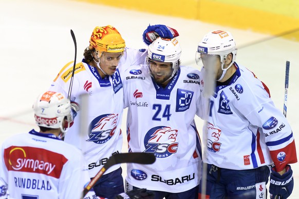 Les joueurs zurichois, laissent eclater leur joie, lors du match du championnat suisse de hockey sur glace de National League LNA, entre le Geneve Servette HC et le ZSC Lions, ce samedi 15 octobre 201 ...