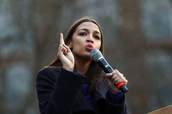 FILE - In this March 8, 2020, file photo Rep. Alexandria Ocasio-Cortez, D-NY., speaks at a campaign rally for then-Democratic presidential candidate Sen. Bernie Sanders, I-Vt., in Ann Arbor, Mich. Now ...