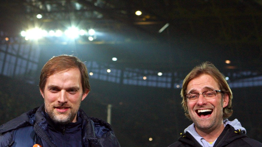 epa04711476 (FILE) A file picture dated 03 March 2012 of Mainz&#039; head coach Thomas Tuchel (L) and Dortmund&#039;s coach Juergen Klopp (R) before the German Bundesliga soccer match between Borussia ...