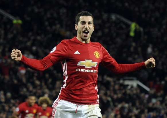 FILE - In this Monday, Dec. 26, 2016 file photo, Manchester United&#039;s Henrikh Mkhitaryan celebrates after scoring his side&#039;s third goal during their English Premier League soccer against Sund ...