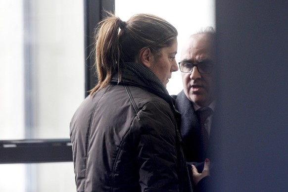 epa05667435 Marga Garau (L), wife of Fernando Blanco arrested for a scam using his young daughter&#039;s rare disease, and her lawyer Alberto Martin (R) arrive to Seu d&#039;Urgell court to declare be ...