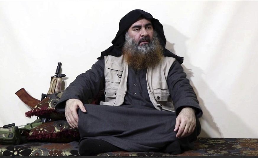 This image made from video posted on a militant website on Monday, April 29, 2019, purports to show the leader of the Islamic State group, Abu Bakr al-Baghdadi, being interviewed by his group&#039;s A ...