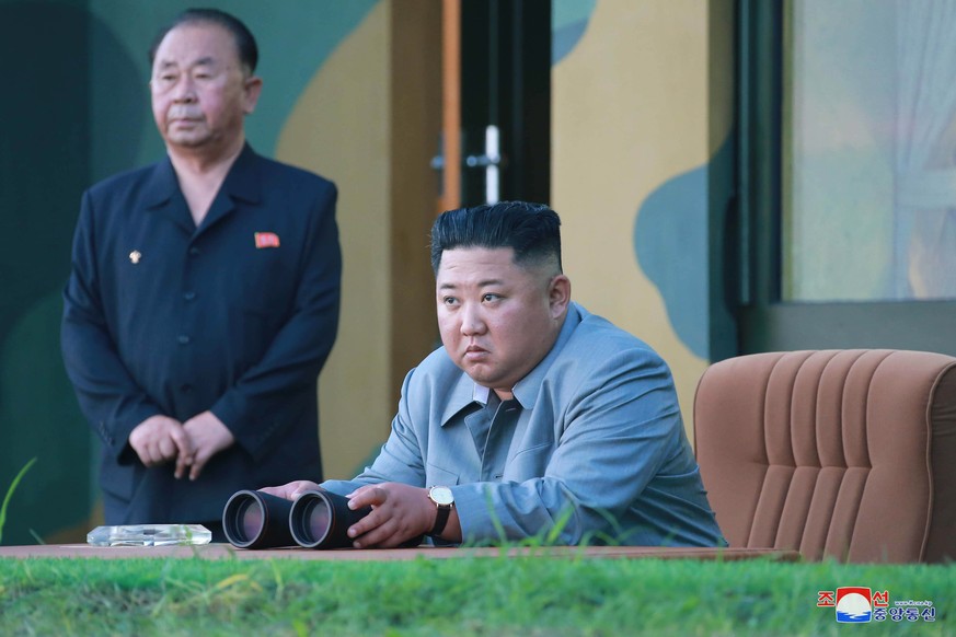 epaselect epa07741129 A photo released by the official North Korean Central News Agency (KCNA) on 26 July 2019 shows Kim Jong-Un (R), chairman of the Workers&#039; Party of Korea, and leader of the na ...