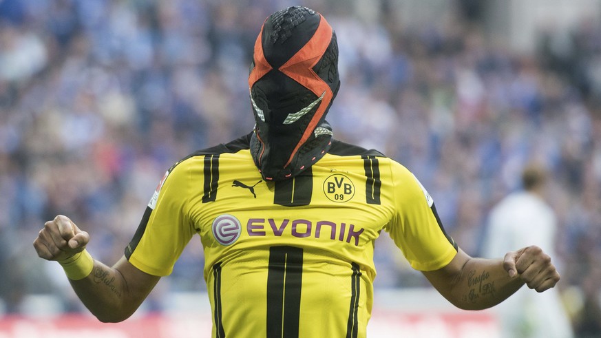 Pierre-Emerick Aubameyang from Dortmund celebrates with a mask after scoring during the German Bundesliga soccer match between FC Schalke 04 and Borussia Dortmund in the in Veltins Arena, Gelsenkirche ...