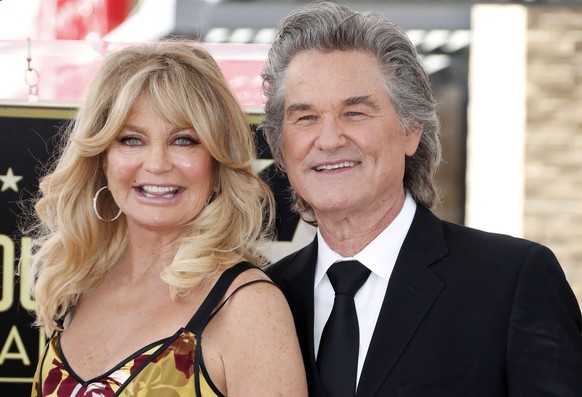 epa09063255 (FILE) - US actress Goldie Hawn (L) and partner US actor Kurt Russell pose during their star ceremony on the Hollywood Walk of Fame, in Hollywood, California, USA, 04 May 2017 (reissued 09 ...