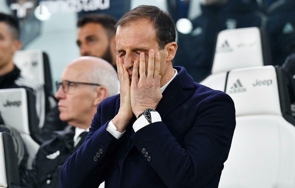 Juventus coach Massimiliano Allegri holds his face during the Serie A soccer match between Juventus and Udinese at the Allianz Stadium in Turin, Italy, Friday, March 8, 2019. (Alessandro Di Marco/ANSA ...