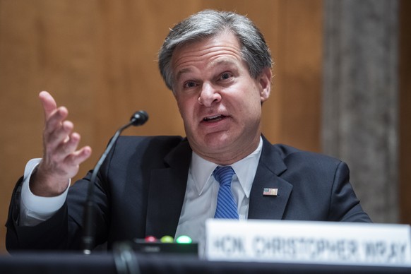 epa08693973 FBI Director Christopher Wray, testifies during the Senate Homeland Security and Governmental Affairs Committee hearing titled &#039;Threats to the Homeland,&#039; in Dirksen Senate Office ...