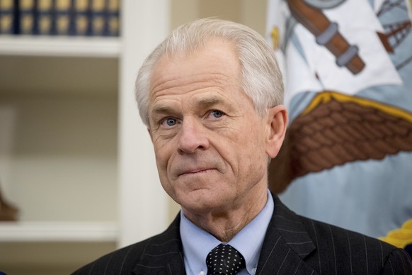 FILE - In this March 31, 2017 file photo, National Trade Council adviser Peter Navarro appears before President Donald Trump arrives to sign executive orders regarding trade in the Oval Office at the  ...