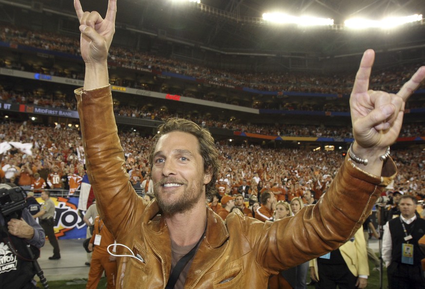 FILE - In this Jan. 5, 2009, file photo, actor Matthew McConaughey celebrates after Texas defeated Ohio State 24-21 in the Fiesta Bowl NCAA college football game in Glendale, Ariz. The University of T ...