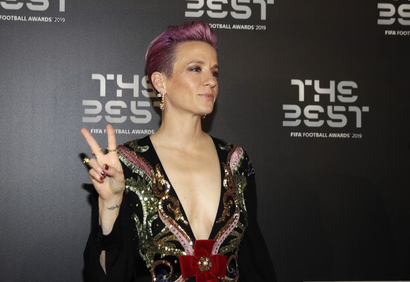 United States forward Megan Rapinoe arrives to attend the Best FIFA soccer awards, in Milan&#039;s La Scala theater, northern Italy, Monday, Sept. 23, 2019. Netherlands defender Virgil van Dijk is up  ...