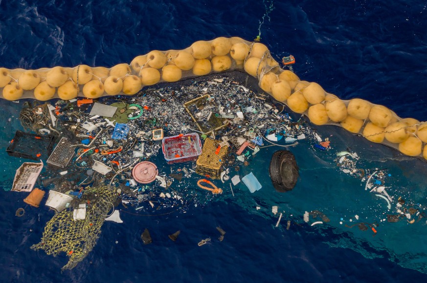 epa07892087 A handout photo made available by The Ocean Cleanup shows the company&#039;s ocean cleanup prototype System 001/B capturing plastic debris in the Great Pacific Garbage Patch, in the Pacifi ...