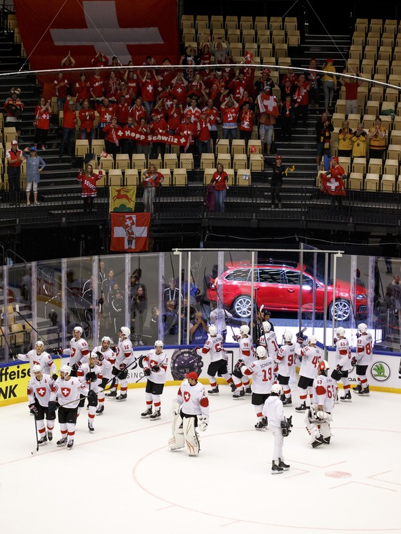 Switzerland&#039;s players cheer their supporters after winning against Finland, during the IIHF 2018 World Championship quarter final game between Finland and Switzerland, at the Jyske Bank Boxen, in ...
