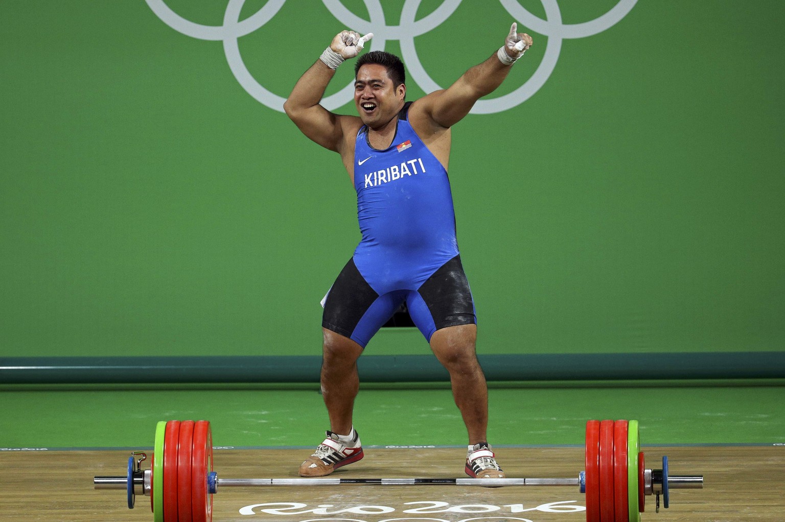 2016 Rio Olympics Weightlifting - Final - Men&#039;s 105kg - Riocentro - Pavilion 2 - Rio de Janeiro, Brazil - 15/08/2016. David Katoatau (KIR) of Kiribati celebrates a successful lift. REUTERS/Stoyan ...