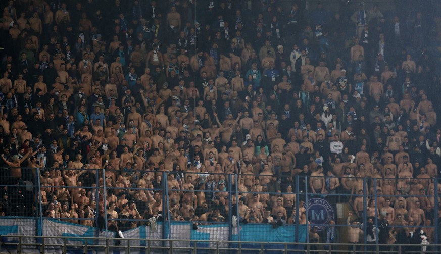 epa07365339 Zenit fans cheer for their team during the UEFA Europa League round of 32 first leg soccer match between Fenerbahce and Zenit in Istanbul, Turkey 12 February 2019. EPA/ERDEM SAHIN