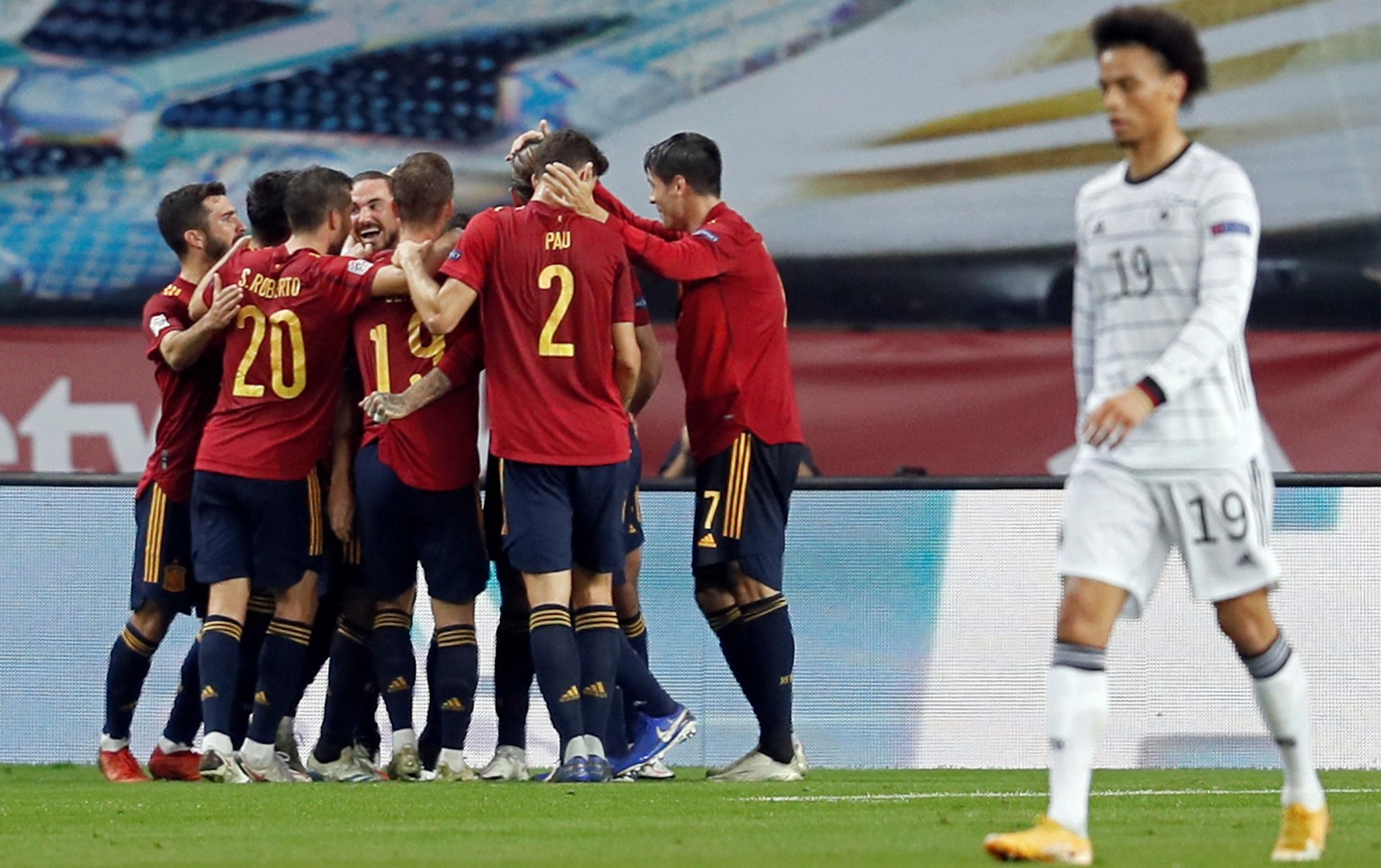 epa08826126 Spanish national soccer team players celebrate the 0-3 lead against Germany, during the UEFA Nations League soccer match, group 4, between Spain and Germany at La Cartuja Stadium in Sevill ...