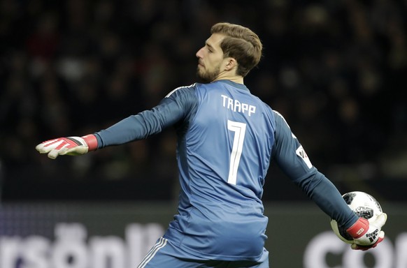 Germany goalkeeper Kevin Trapp throws the ball during the international friendly soccer match between Germany and Brazil in Berlin, Germany, Tuesday, March 27, 2018. (AP Photo/Markus Schreiber)