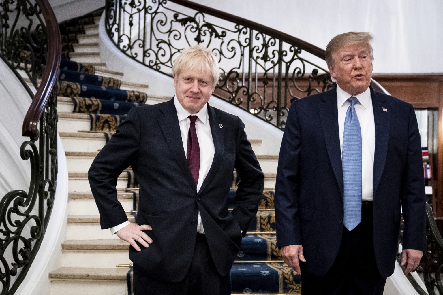 President Donald Trump and Britain&#039;s Prime Minister Boris Johnson, left, speak to the media before a working breakfast meeting at the Hotel du Palais on the sidelines of the G-7 summit in Biarrit ...