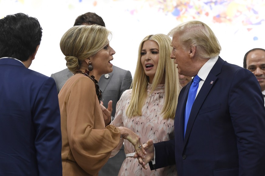 President Donald Trump and Ivanka Trump talk with Queen Maxima, second left, of the Netherlands following the G-20 summit event on women&#039;s empowerment in Osaka, Japan, Saturday, June 29, 2019. (A ...