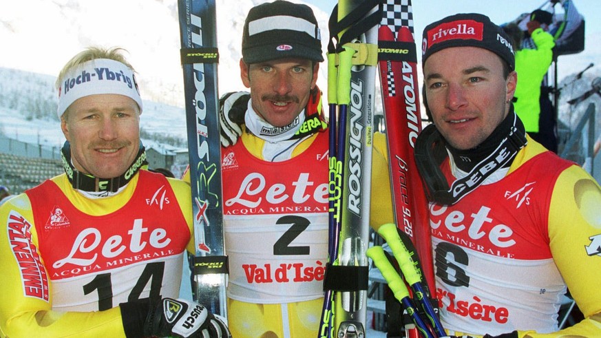 Swiss ski racer Michael von Gruenigen, center, who won today&#039;s giant slalom in Val d&#039;Isere, France, Sunday, December 14, 1997, poses with his Swiss teammates Urs Kaelin, left, who finished f ...