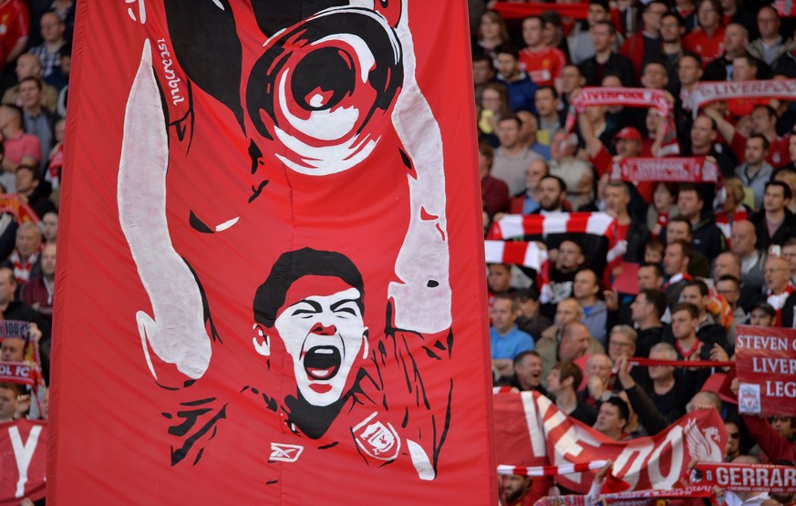 epa05645113 (FILE) A file of a flag with a drowning of Liverpool&#039;s Steven Gerrard is held up in the Kop stand at Anfield before the English Premier League soccer match between Liverpool and Cryst ...