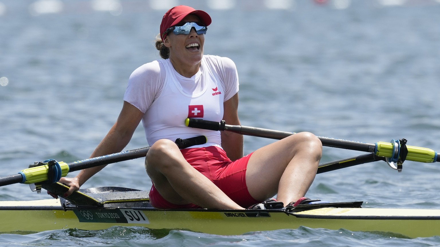 Jeannine Gmelin of Switzerland reacts after competing in the women&#039;s rowing single sculls semifinal at the 2020 Summer Olympics, Thursday, July 29, 2021, in Tokyo, Japan. (AP Photo/Darron Cumming ...
