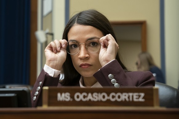 Rep. Alexandria Ocasio-Cortez, D-N.Y., attends a House Oversight Committee hearing on high prescription drugs prices shortly after her private meeting with Speaker of the House Nancy Pelosi, D-Calif., ...