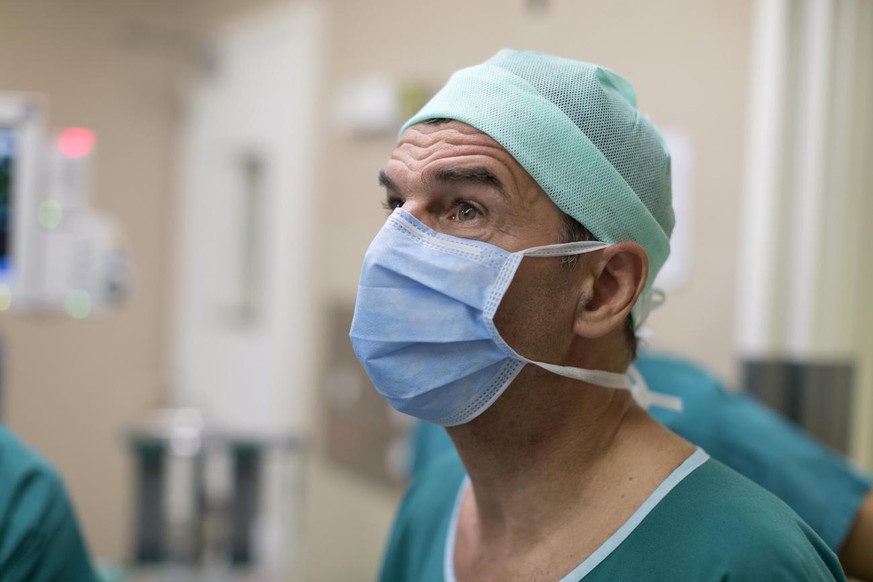 Swiss heart surgeon and pediatrician Rene Pretre pictured before performing cardiac surgery on a two-year-old child at the Lausanne University Hospital, Centre Hospitalier Universitaire Vaudois, CHUV, ...