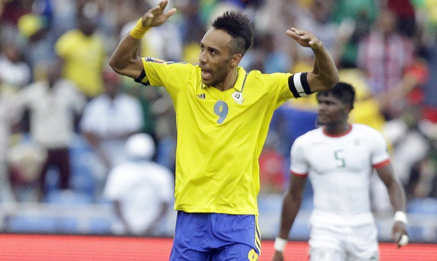 Gabon&#039;s, Pierre Emerick Aubameyang, left, celebrates after scoring, during the African Cup of Nations Group A soccer match between Gabon and Burkina Faso at the Stade de l&#039;Amitie, in Librevi ...