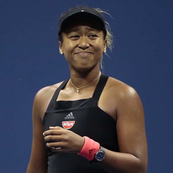 Naomi Osaka, of Japan, reacts after defeating Serena Williams in the women&#039;s final of the U.S. Open tennis tournament, Saturday, Sept. 8, 2018, in New York. (AP Photo/Andres Kudacki)