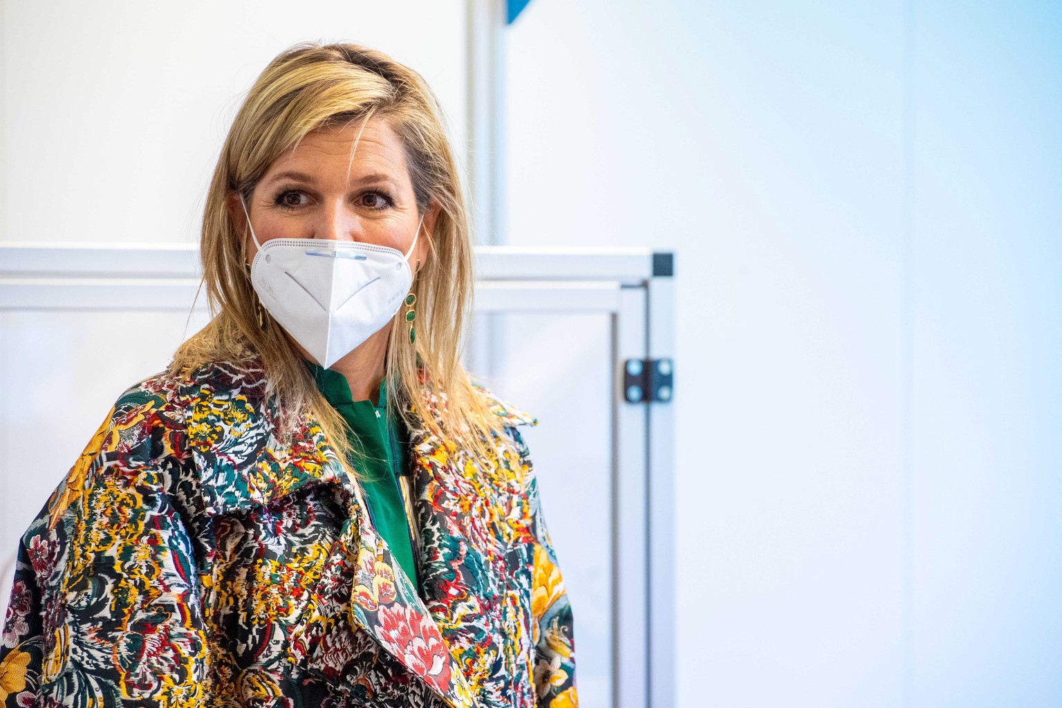 epa08366845 Dutch Queen Maxima wears a protective face mask during a working visit to technology company Demcon in Enschede, The Netherlands, 16 April 2020. The company has developed, tested and produ ...